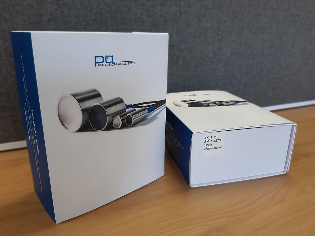 Precision Acoustics new blue and white transducer packaging box